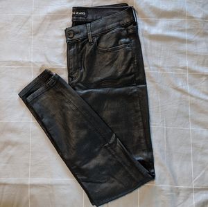 Coated black jeans